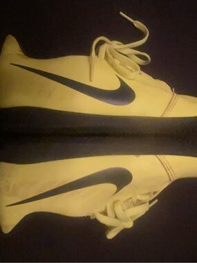 Nike yellow soccer Sneakers with Black Swoosh